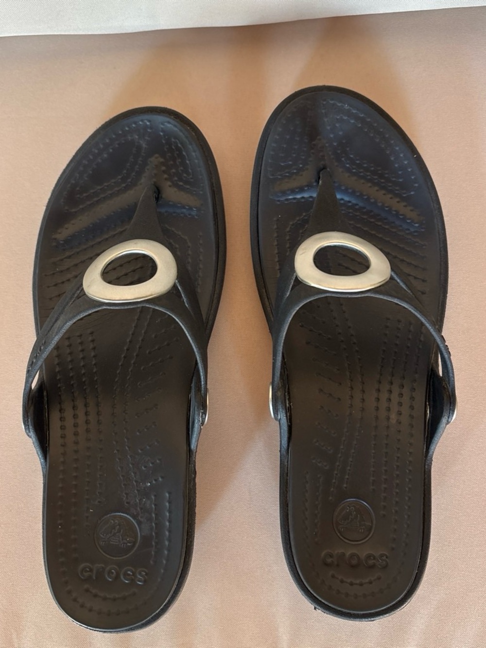 CROCS Womens Black Thong Sandals with Silver Oval Accent